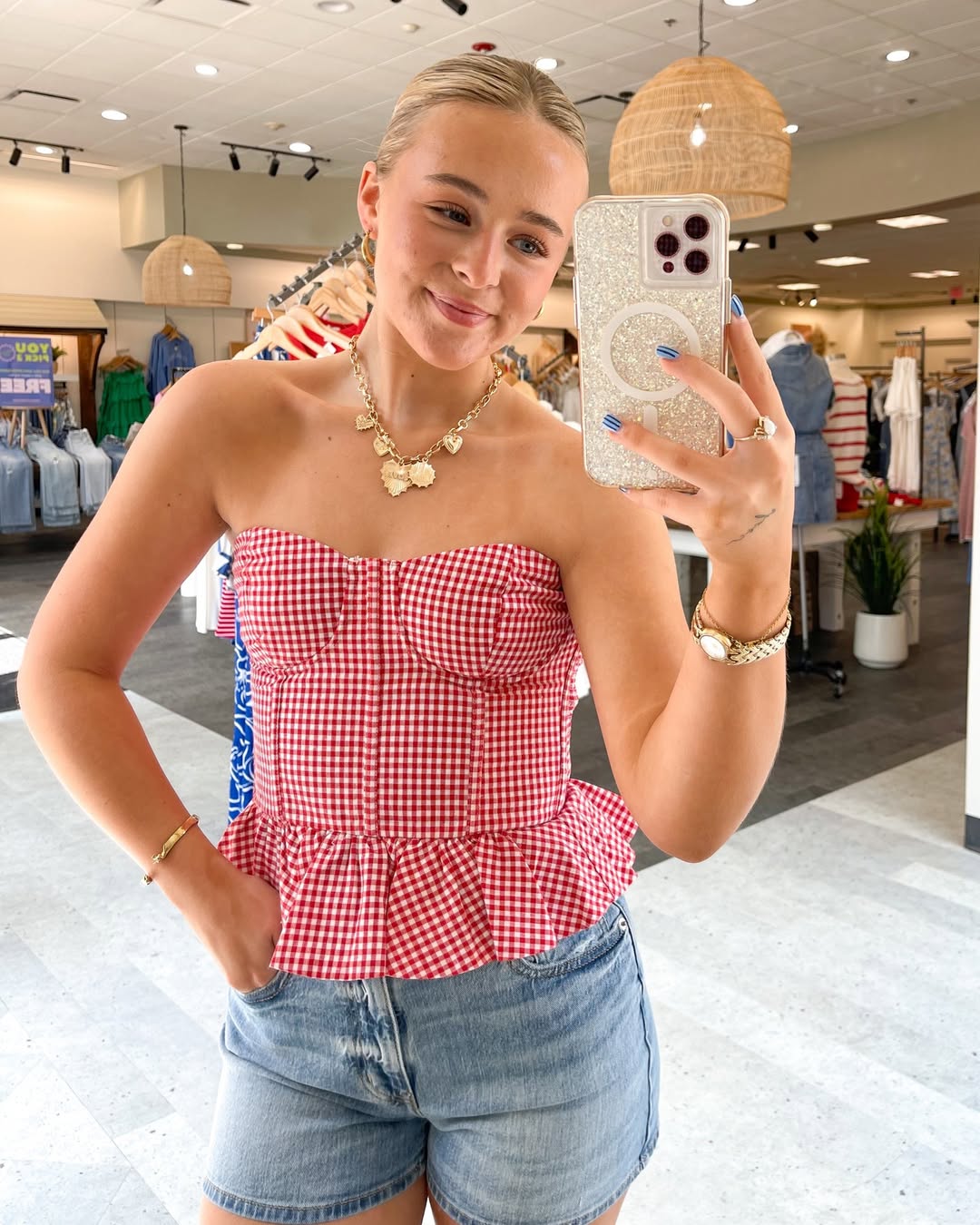 25 Concert Outfit Ideas You Need for 2026 19 Red Gingham Corset Top With Denim Shorts