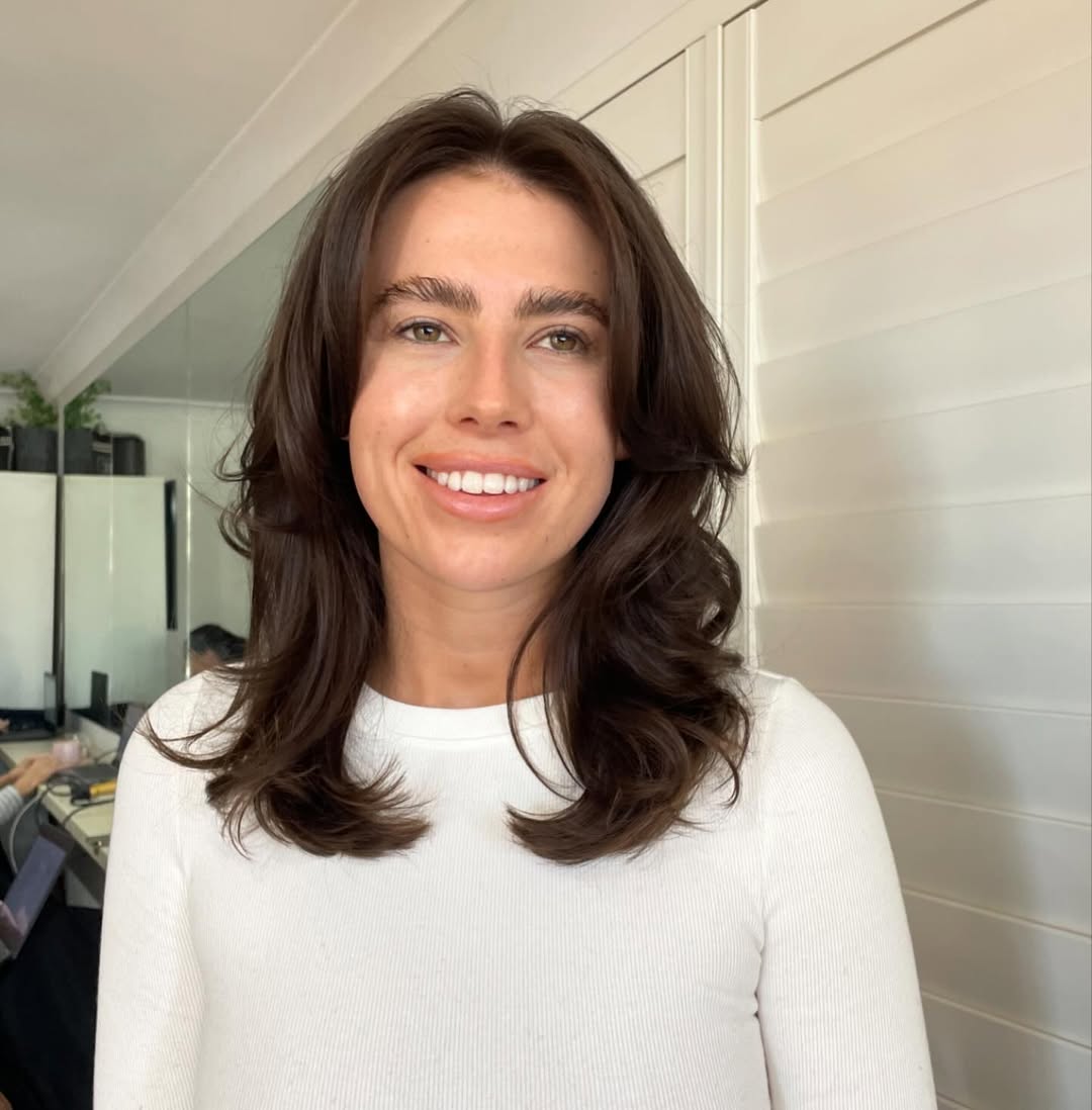 Relaxed Brunette Layers With Subtle Curtain Bangs