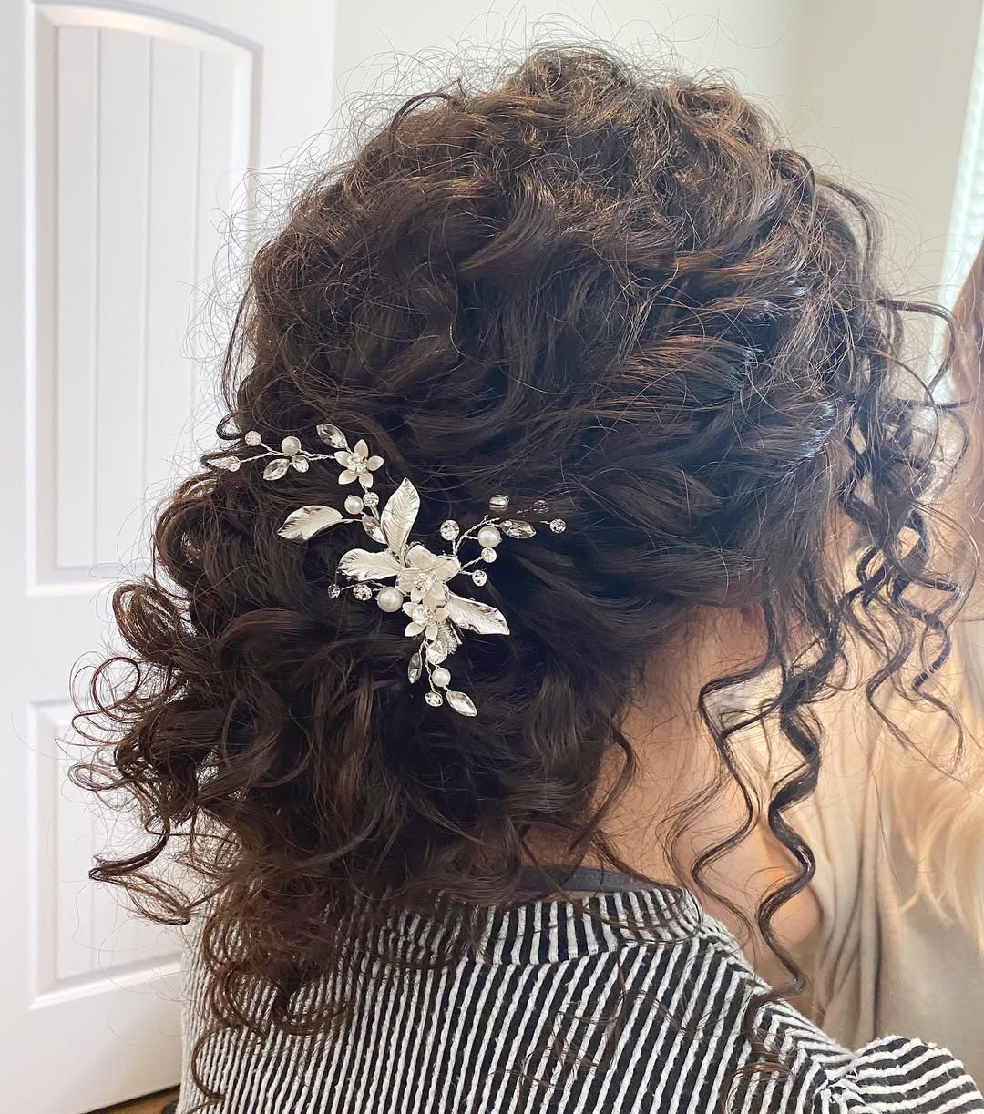 Relaxed Curly Updo with Delicate Hairpiece