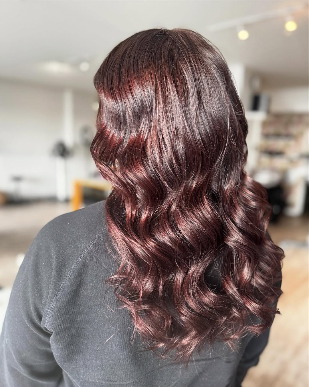 Rich Cherry Brown Wavy Long Hair With Subtle Layers