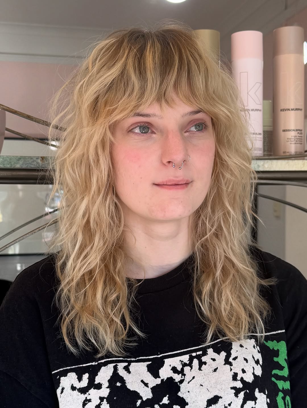 Shaggy Layers With Curly Blonde Fringe