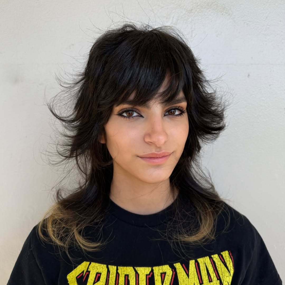 Shaggy Mid-Length Cut With Textured Bangs And Blonde Ends