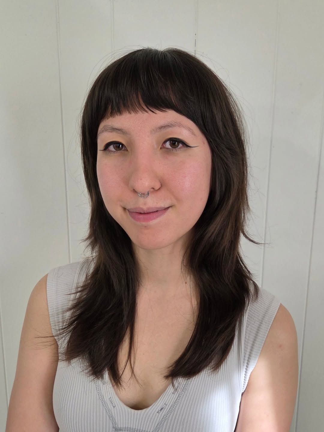 Shaggy Shoulder-Length Cut With Wispy Bangs