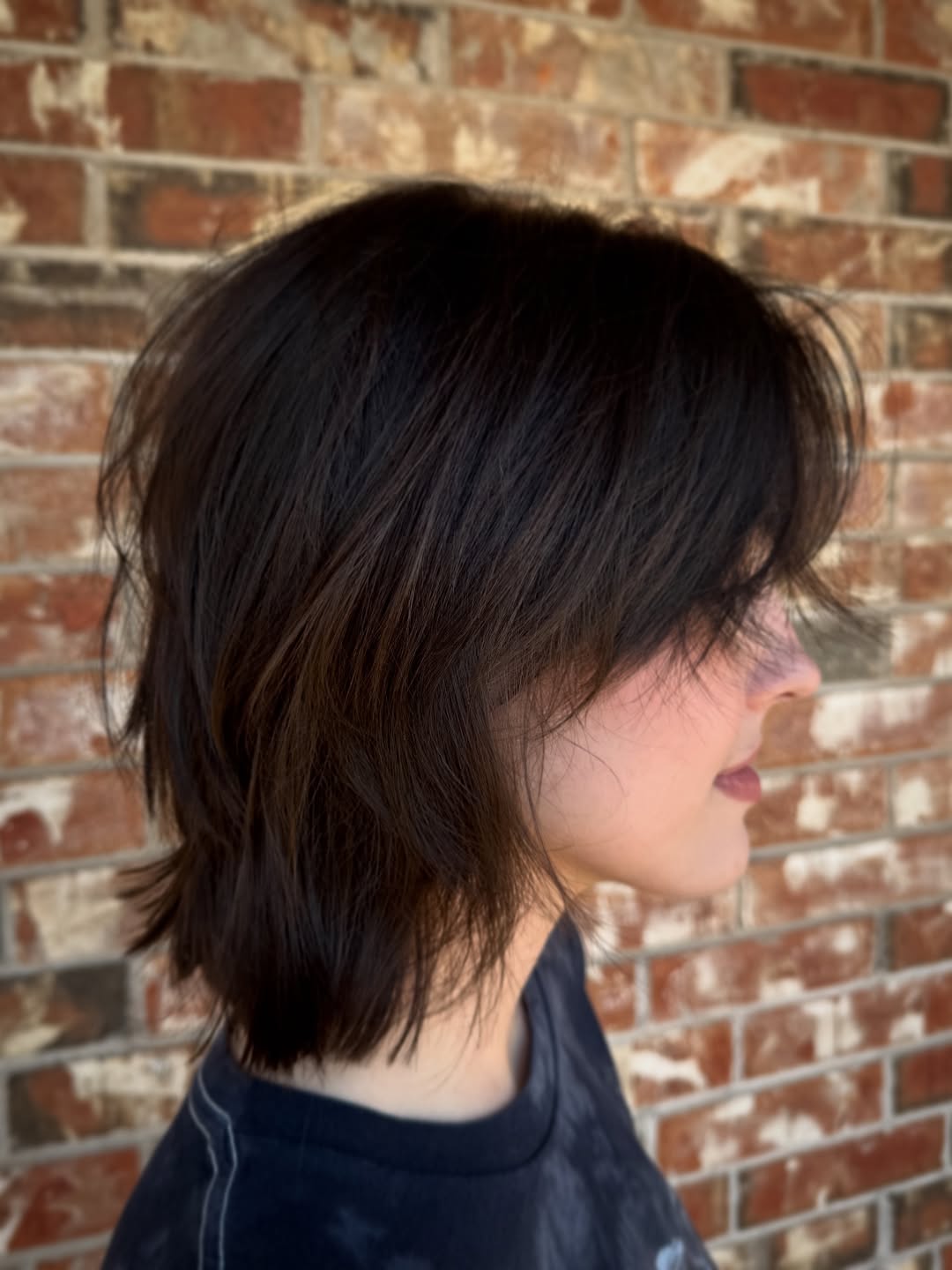 Shaggy Wolf Cut With Face Framing Bangs
