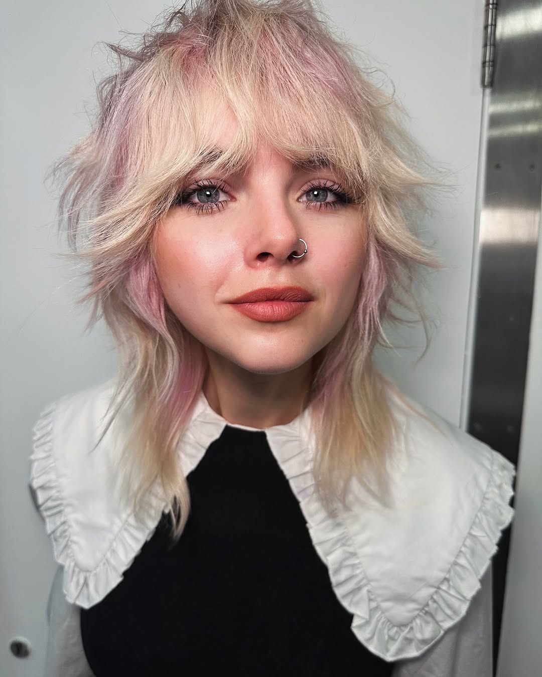 Shaggy Wolf Cut With Pastel Pink Highlights
