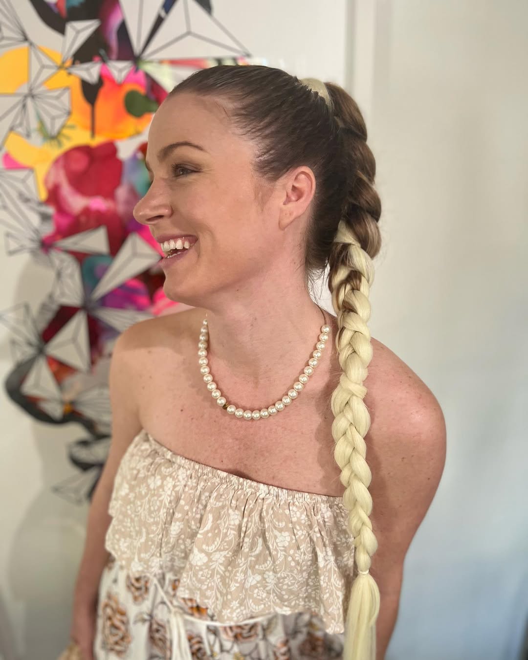 Sleek Braided Low Ponytail With Blonde Extensions