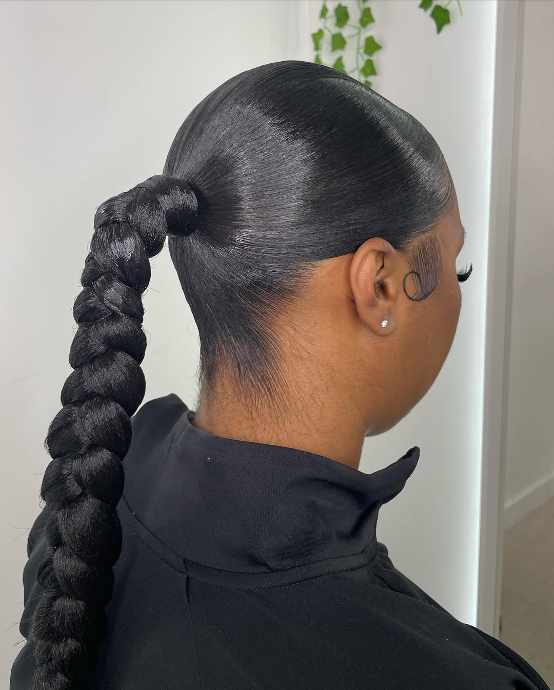 Sleek Braided Ponytail With Laid Edges