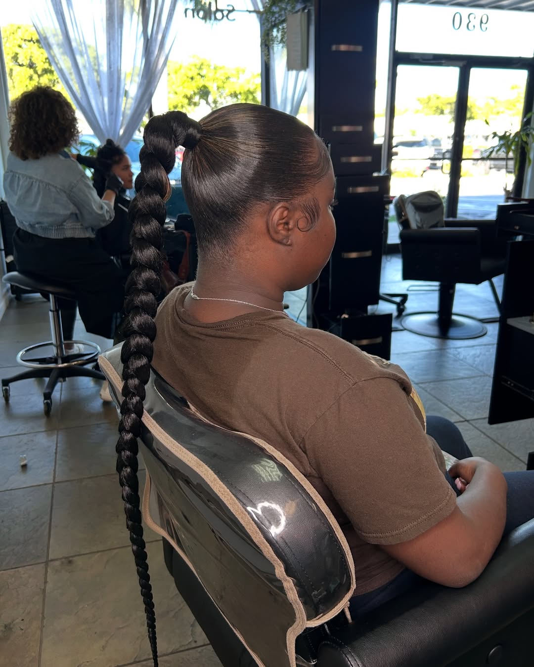 Sleek Braided Ponytail With Laid Edges