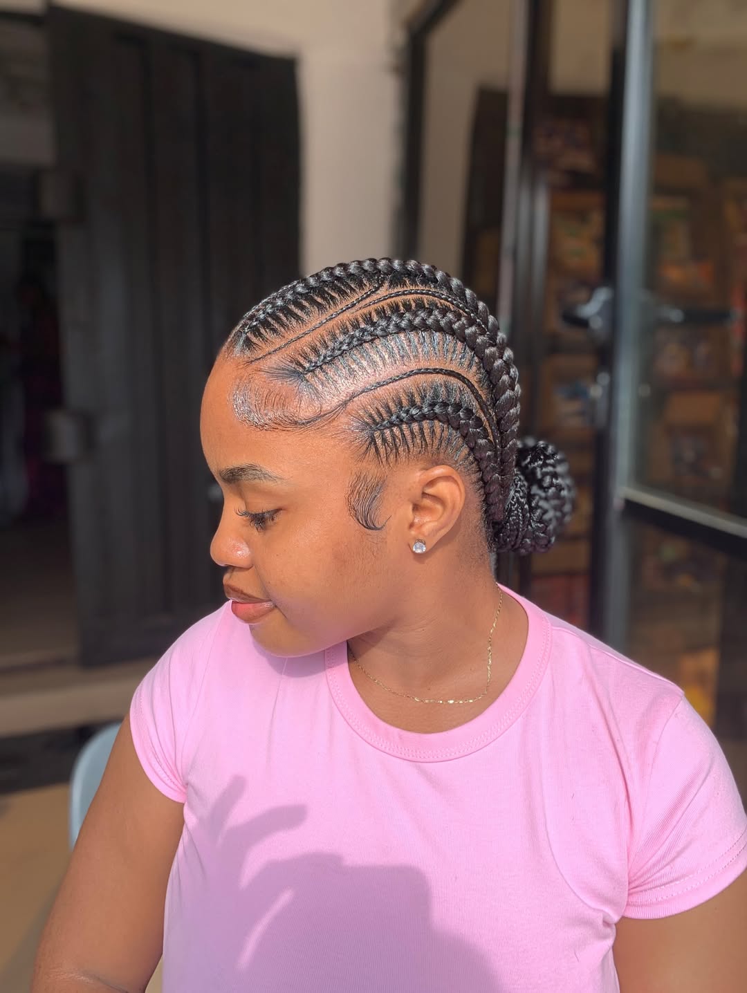 Sleek Cornrows Into Low Bun With Edges