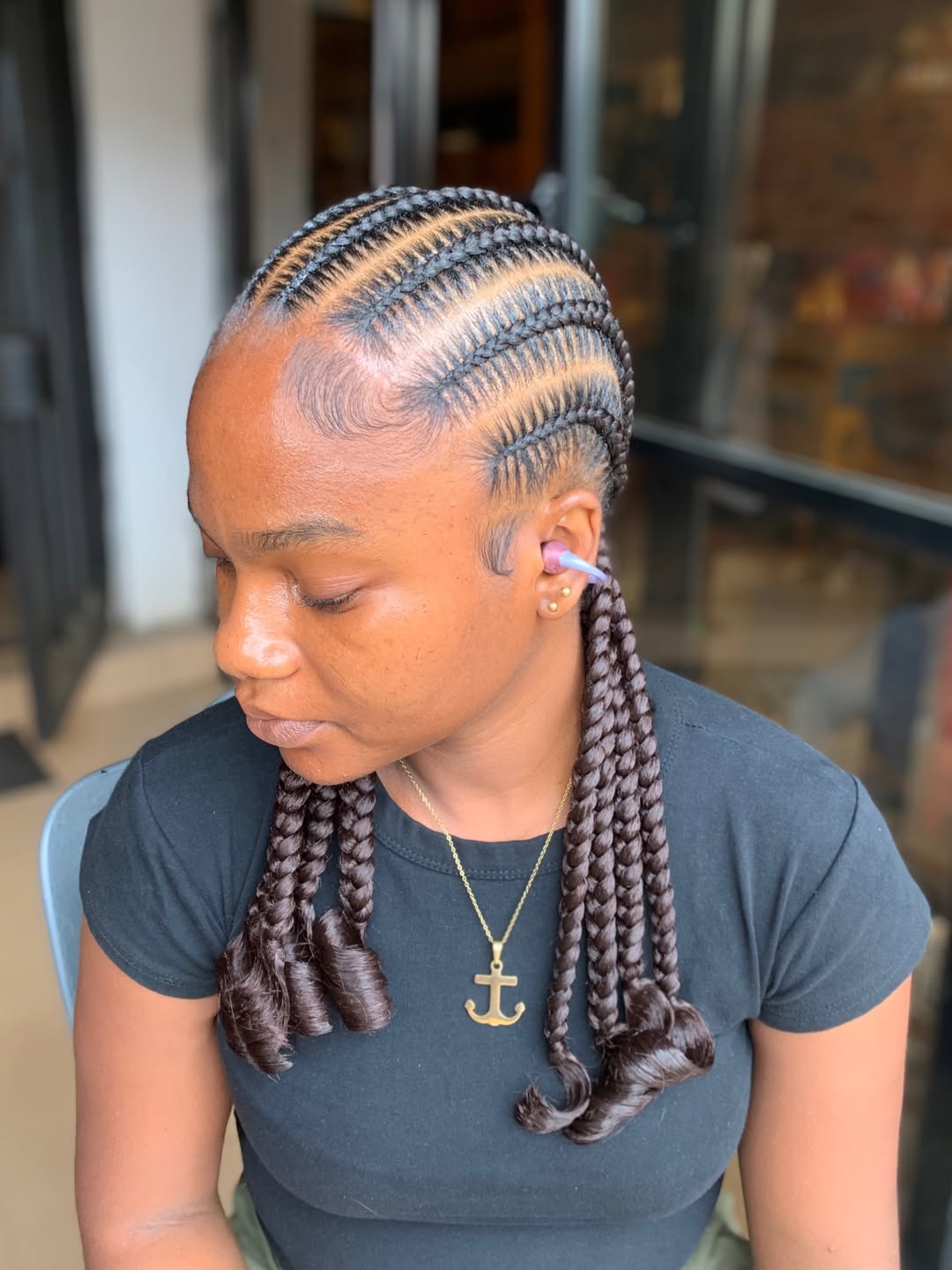 Sleek Cornrows With Curly Braided Ends