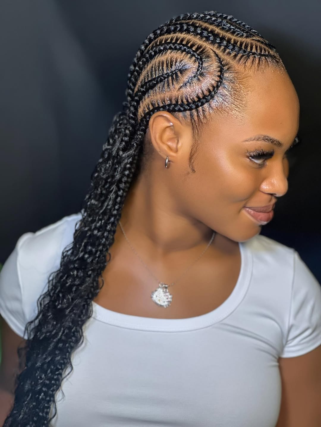 Sleek Cornrows With Wavy Braided Ponytail