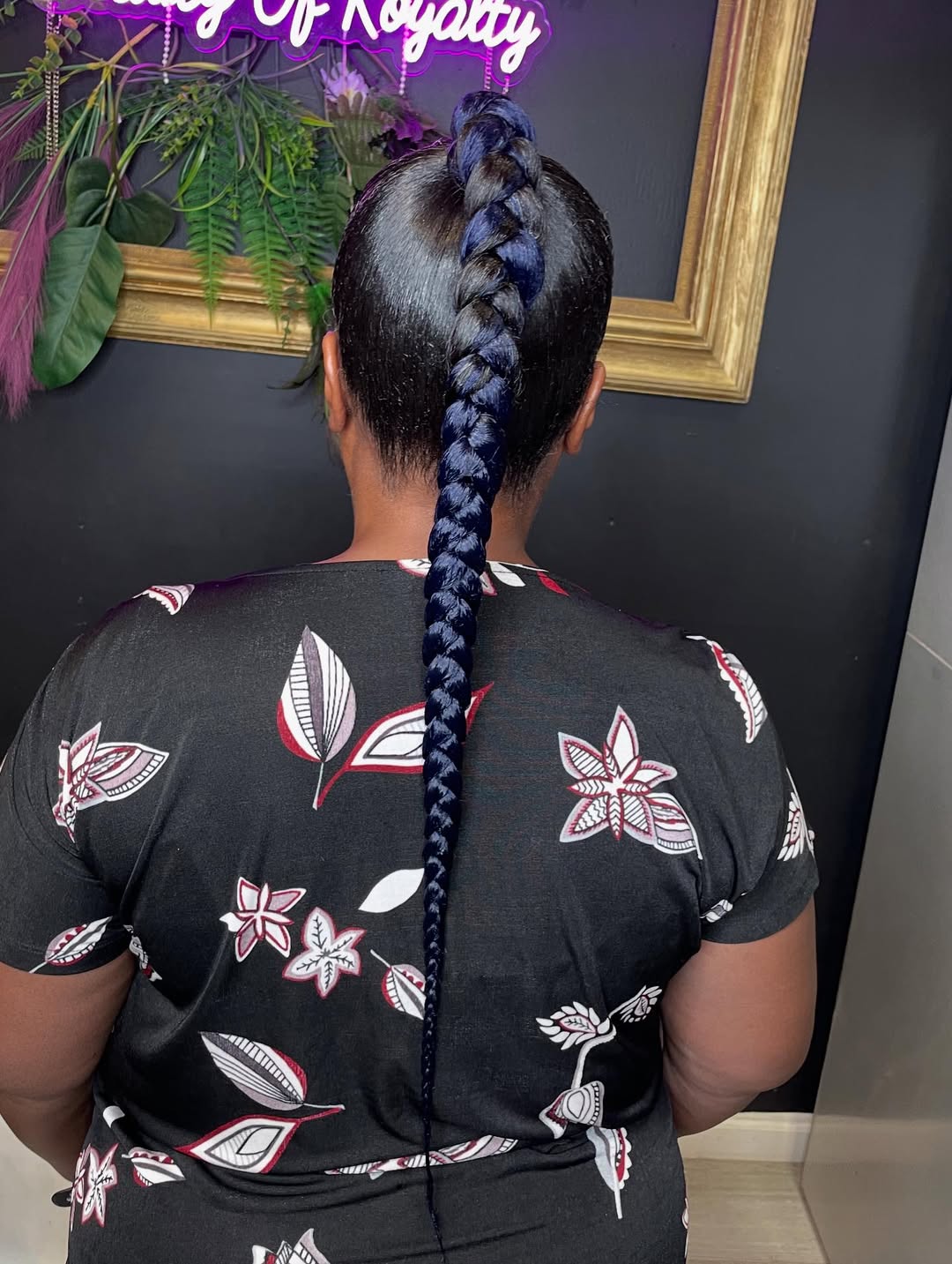 Sleek High Braided Ponytail With Blue Accents