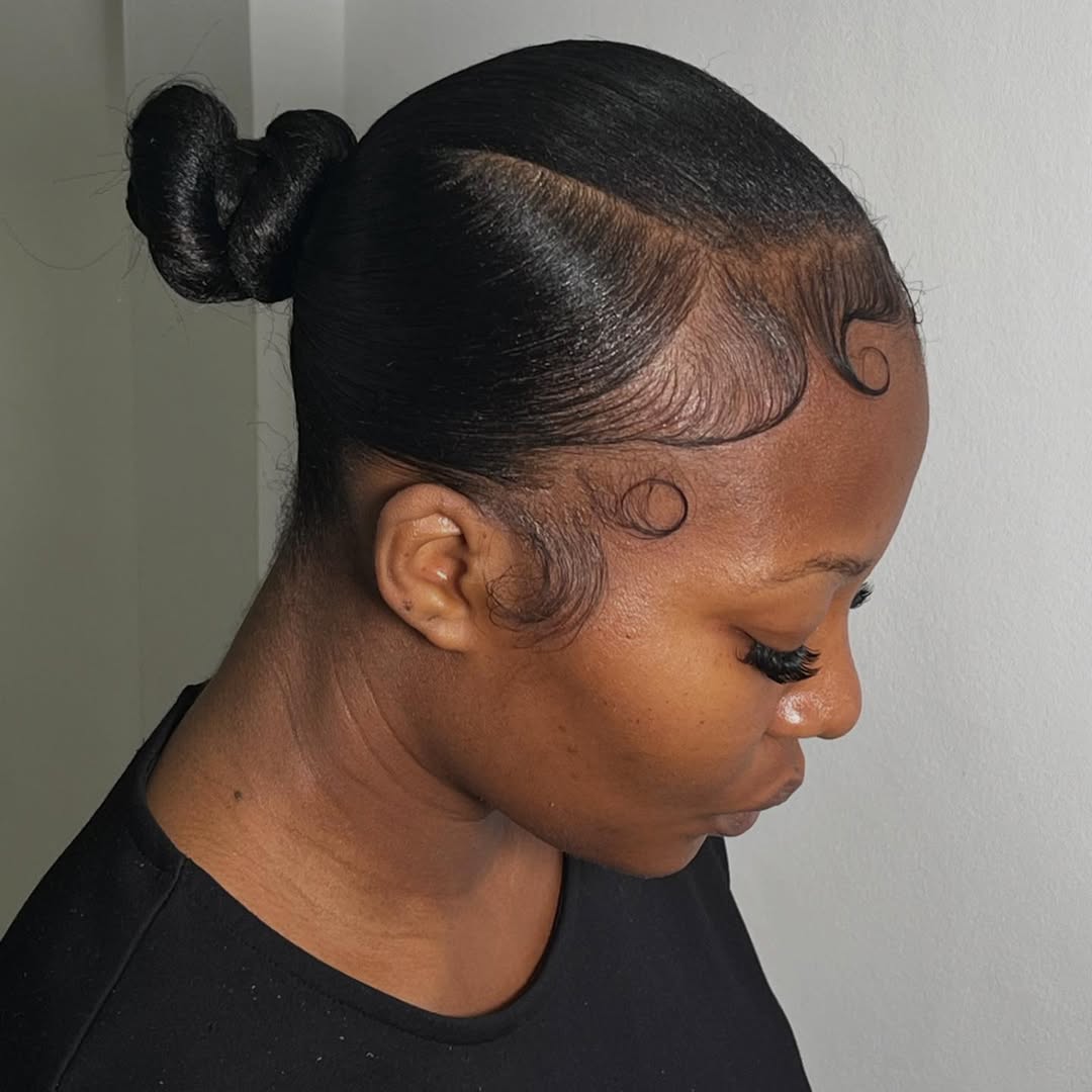 25 Sleek Hairstyles 2026 You Need To Try Now 17 Sleek High Bun With Defined Edges
