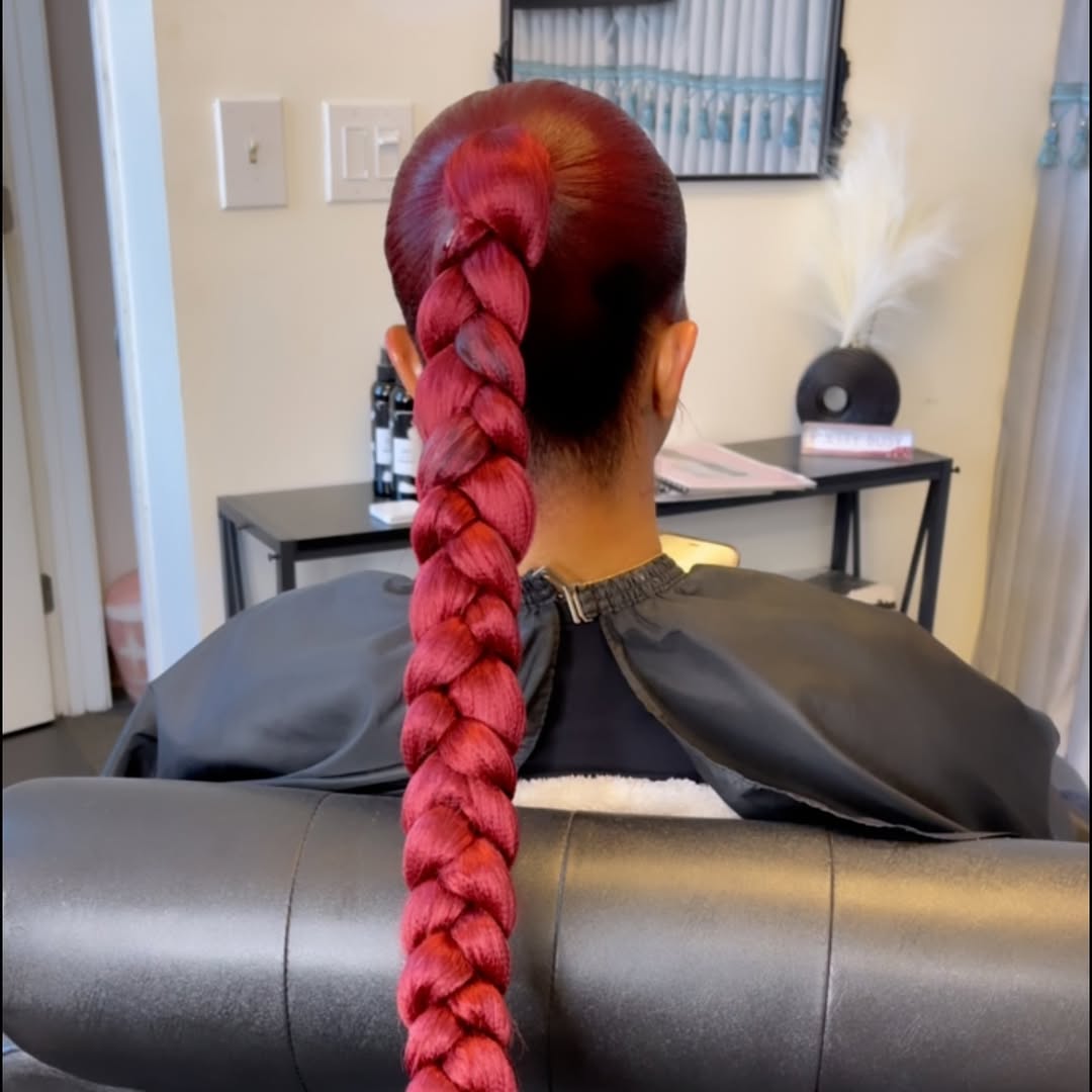 Sleek Long Vibrant Red Braided Ponytail