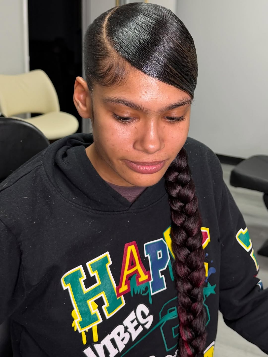 Sleek Side-Part Ponytail With Long Braid