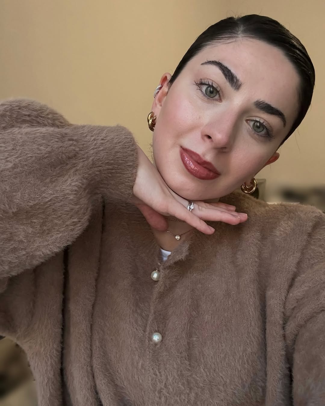 25 Sleek Hairstyles 2026 You Need To Try Now 9 Sleek Slicked Back Low Bun Soft Glam