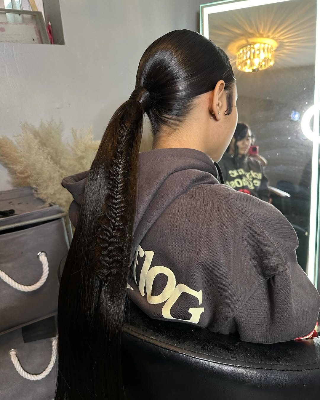 25 Sleek Hairstyles 2026 You Need To Try Now 23 Sleek Waist Length Ponytail With Fishtail Braid Detail