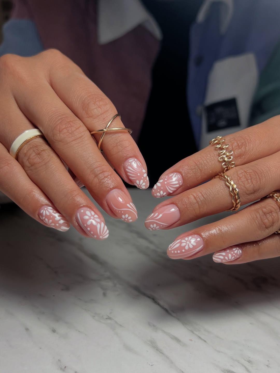 27 Stunning Mexican Nail Designs for 2026 5 Soft Pink Floral Hand-Painted Almond Nails