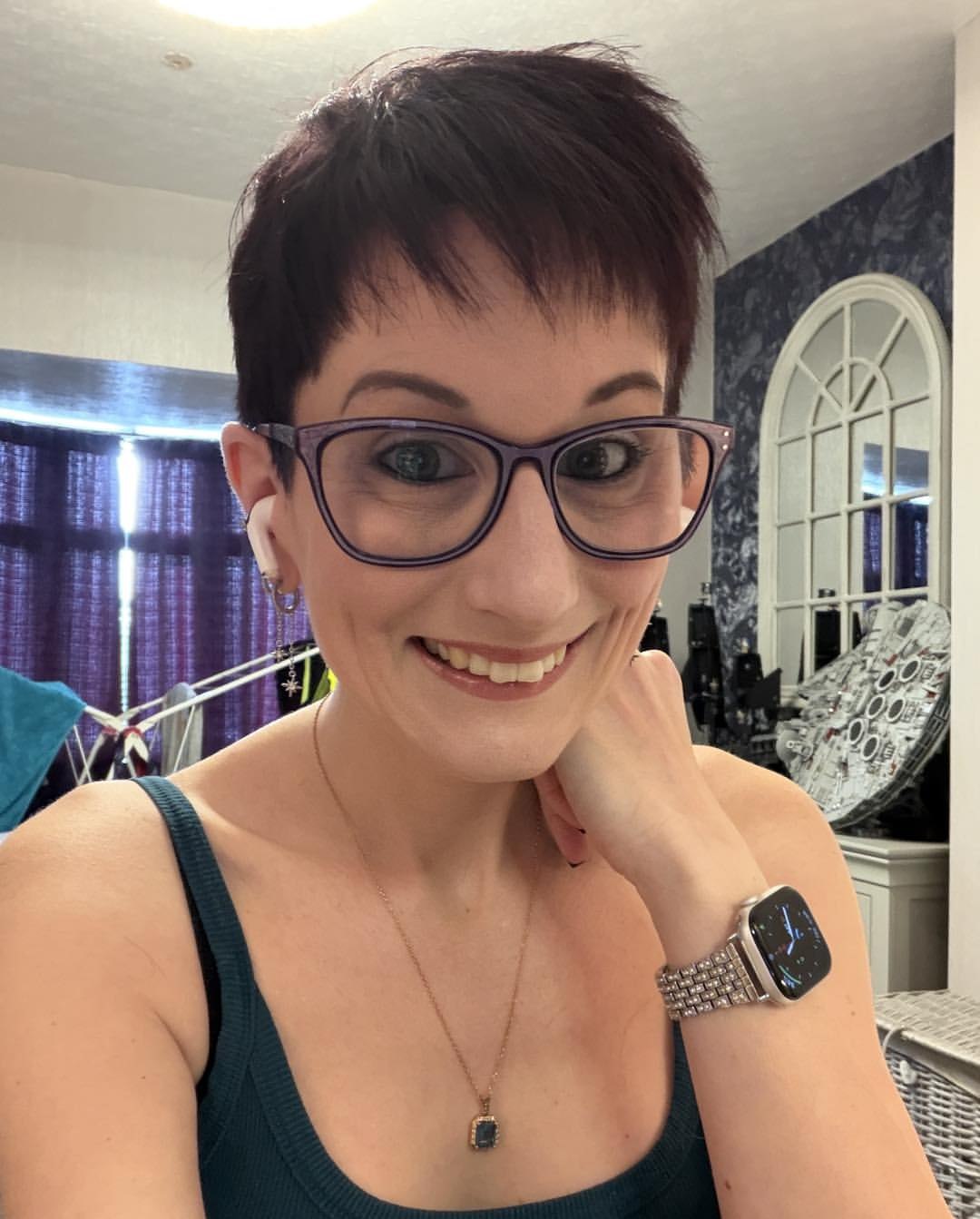 25 Stunning Hairstyles for Older Women in 2026 22 Sophisticated Burgundy Pixie With Textured Fringe