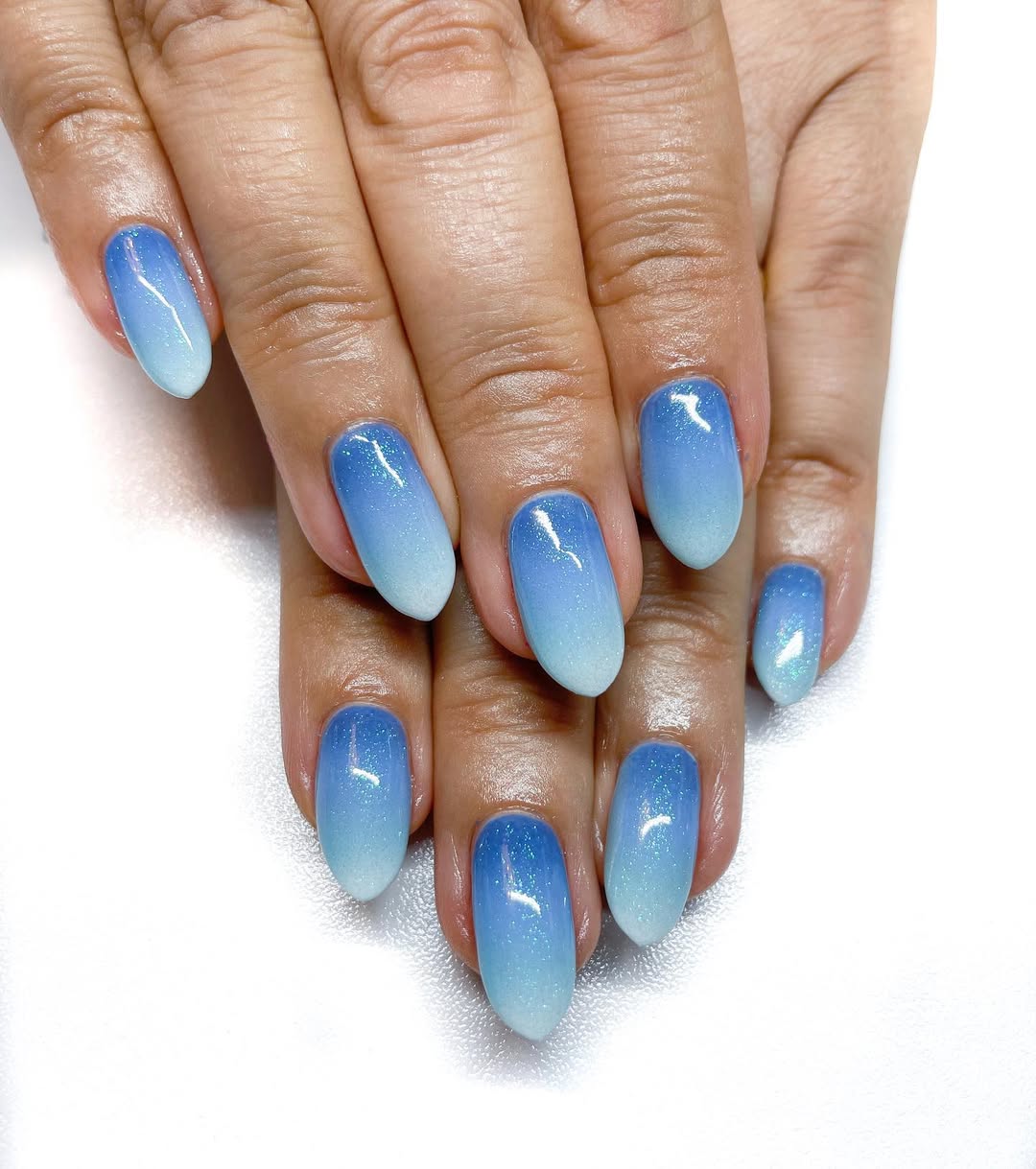 Sparkling Sky Blue Glitter Gradient Oval Nails