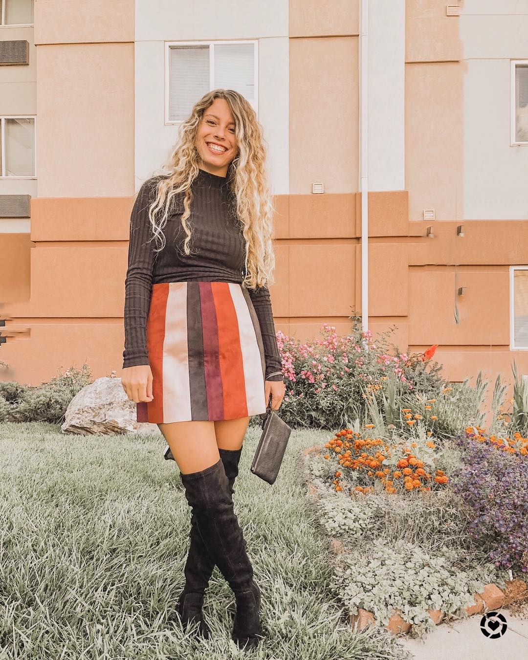 29 Chic Fall Skirt Outfits You Need for 2026 25 Striped Suede Mini Skirt With Thigh-High Boots