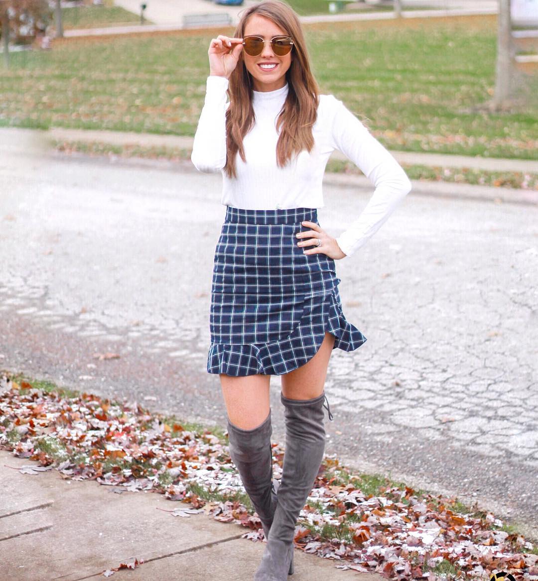 29 Chic Fall Skirt Outfits You Need for 2026 24 Tartan Mini Skirt With Over-the-Knee Boots