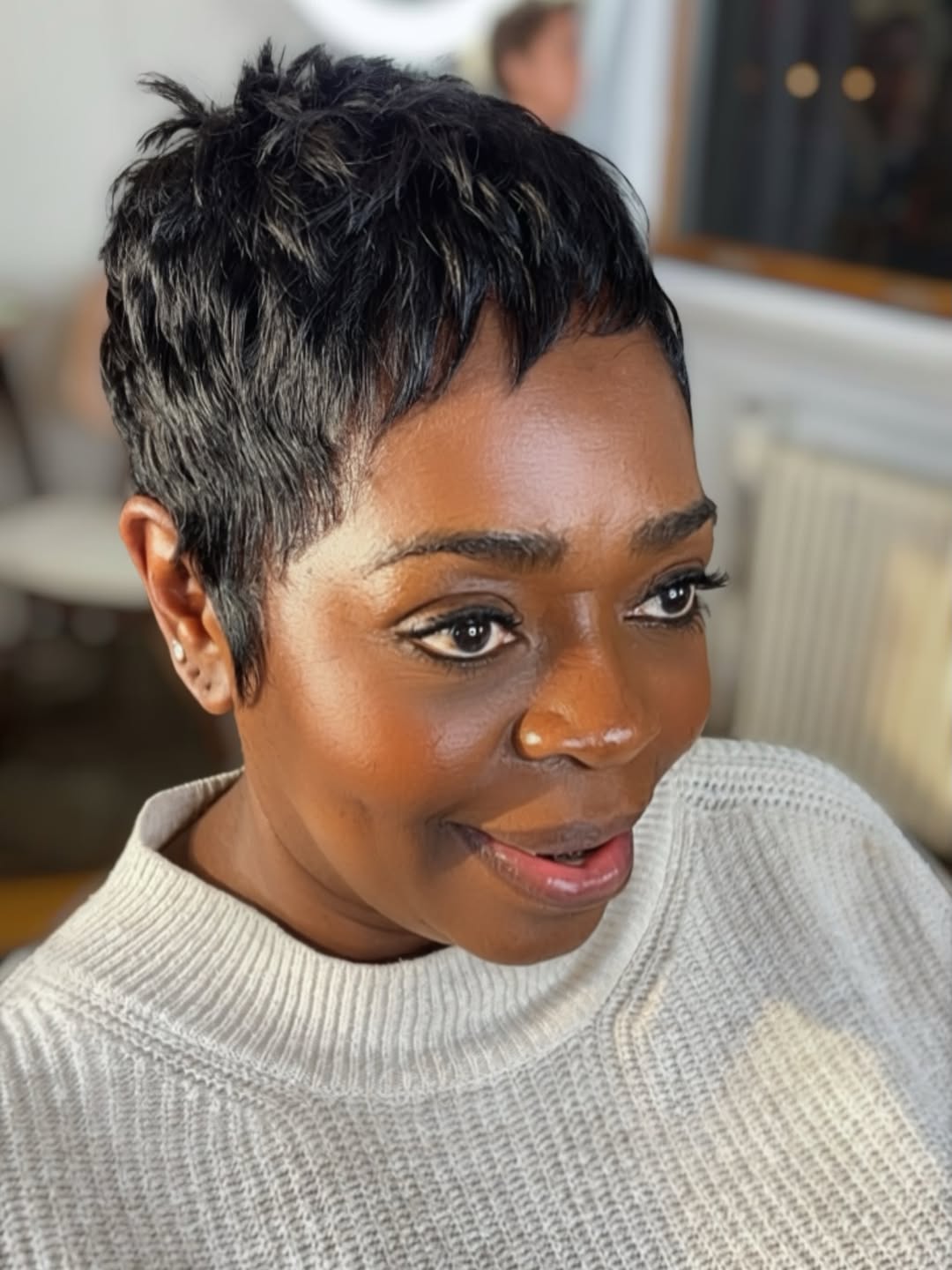Textured Black Pixie With Subtle Highlights