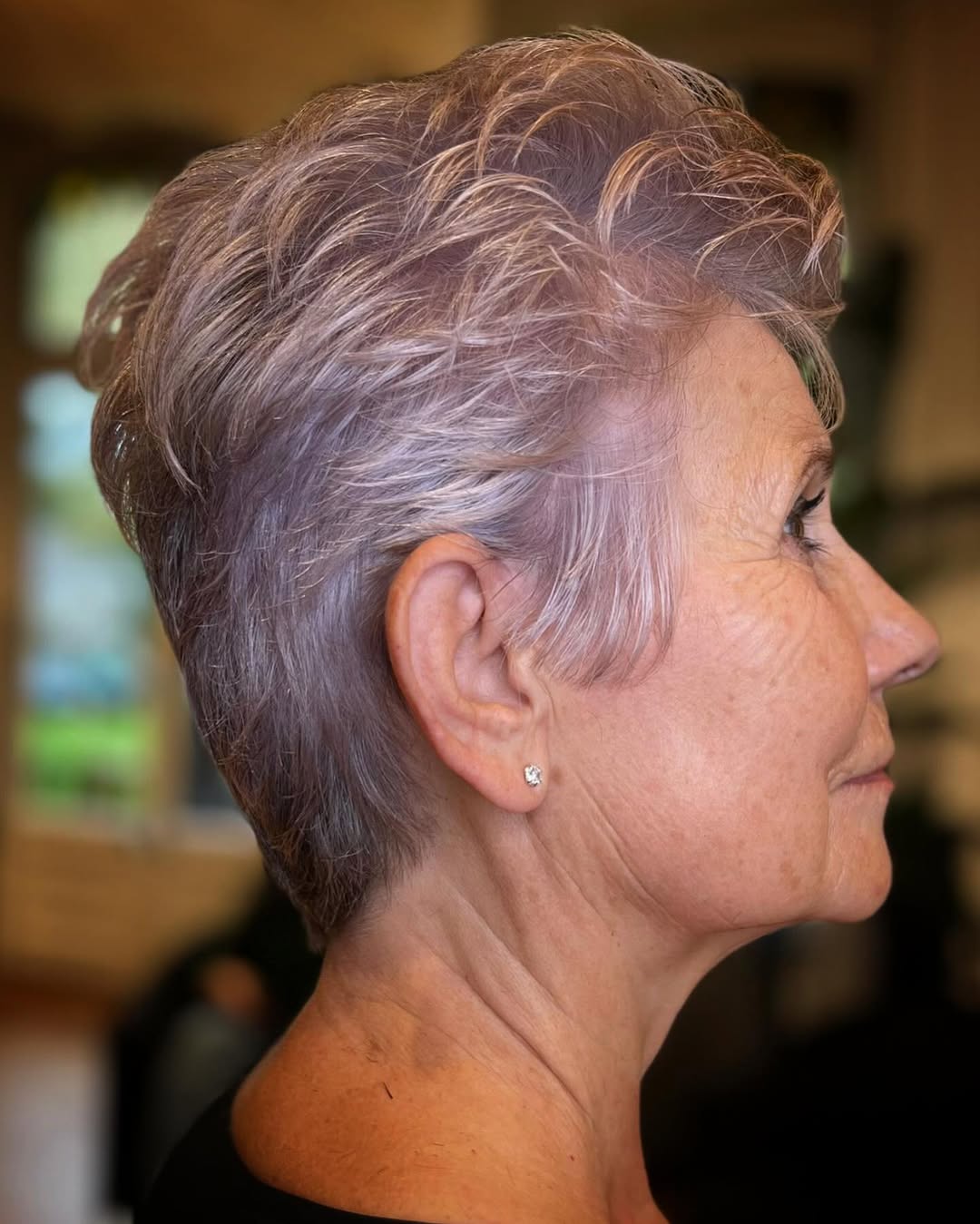 25 Stunning Hairstyles for Older Women in 2026 23 Textured Gray Pixie With Subtle Highlights