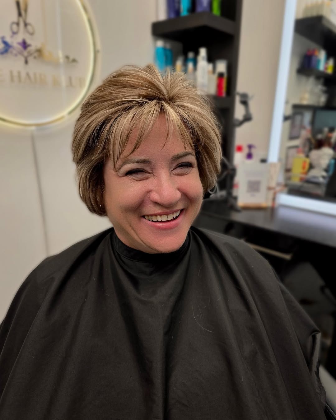 25 Stunning Hairstyles for Older Women in 2026 18 Textured Stacked Pixie With Honey Blonde Highlights