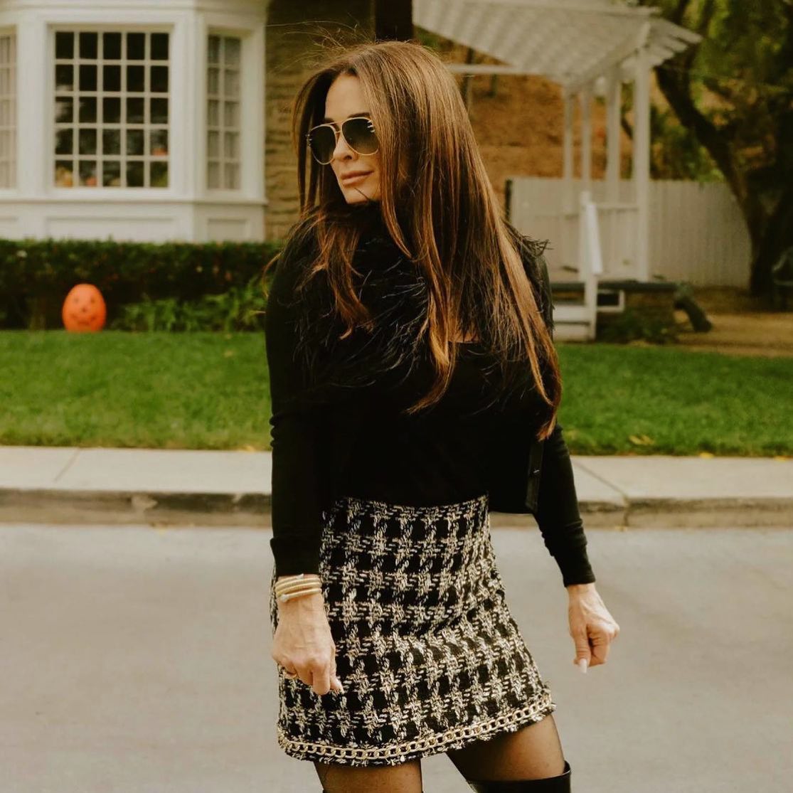 29 Chic Fall Skirt Outfits You Need for 2026 29 Textured Tweed Skirt With Feather Trim Top
