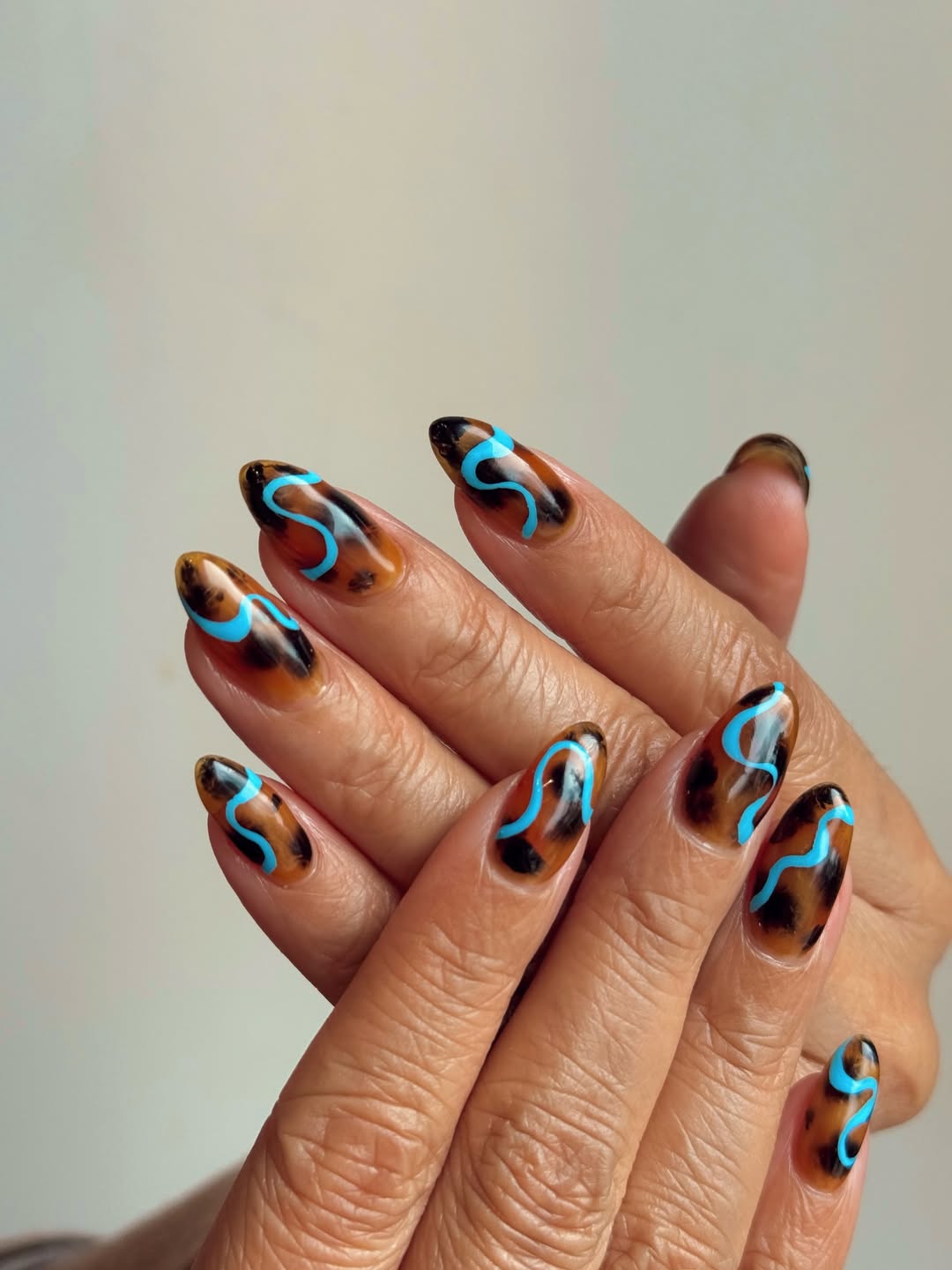 27 Tortoise Nail Trends You Need for 2026 8 Unexpected Blue Swirl Tortoise Shell Nails