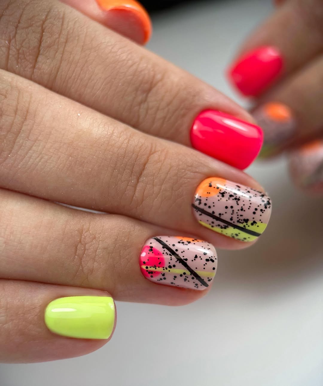 Vibrant Abstract Squoval Nails with Geometric Details