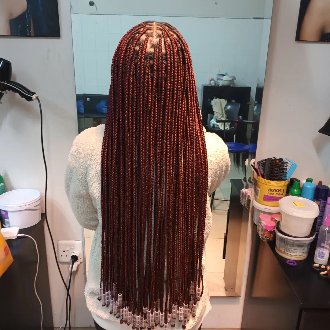 Vibrant Auburn Box Braids With Gold Beads