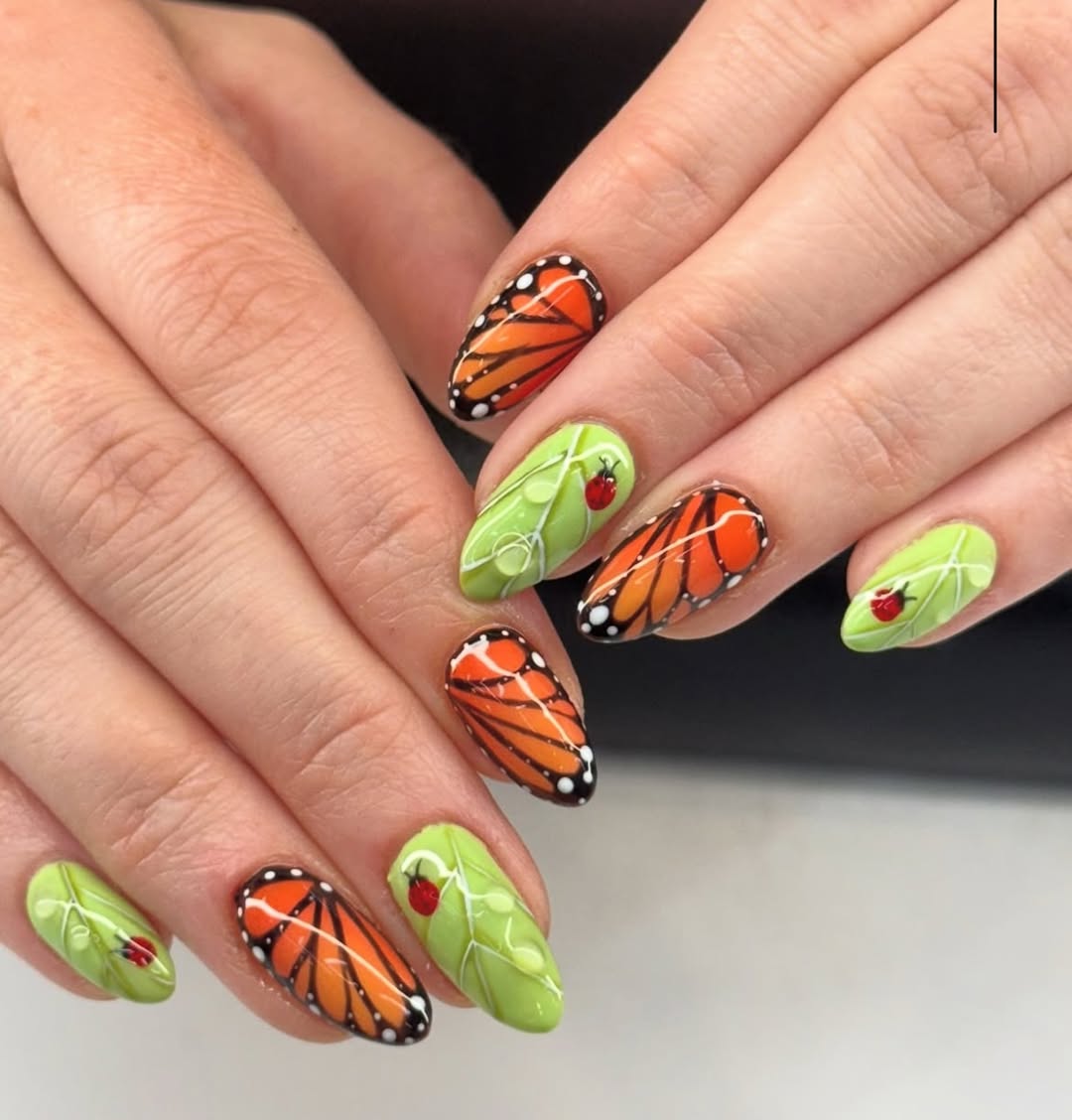 Vibrant Butterfly Wing And Ladybug Green Nails