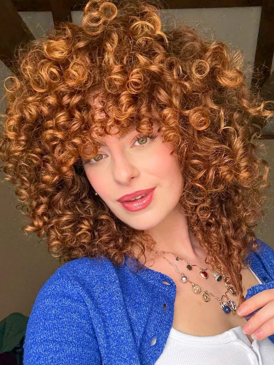 Vibrant Copper Curly Lob With Full Fringe