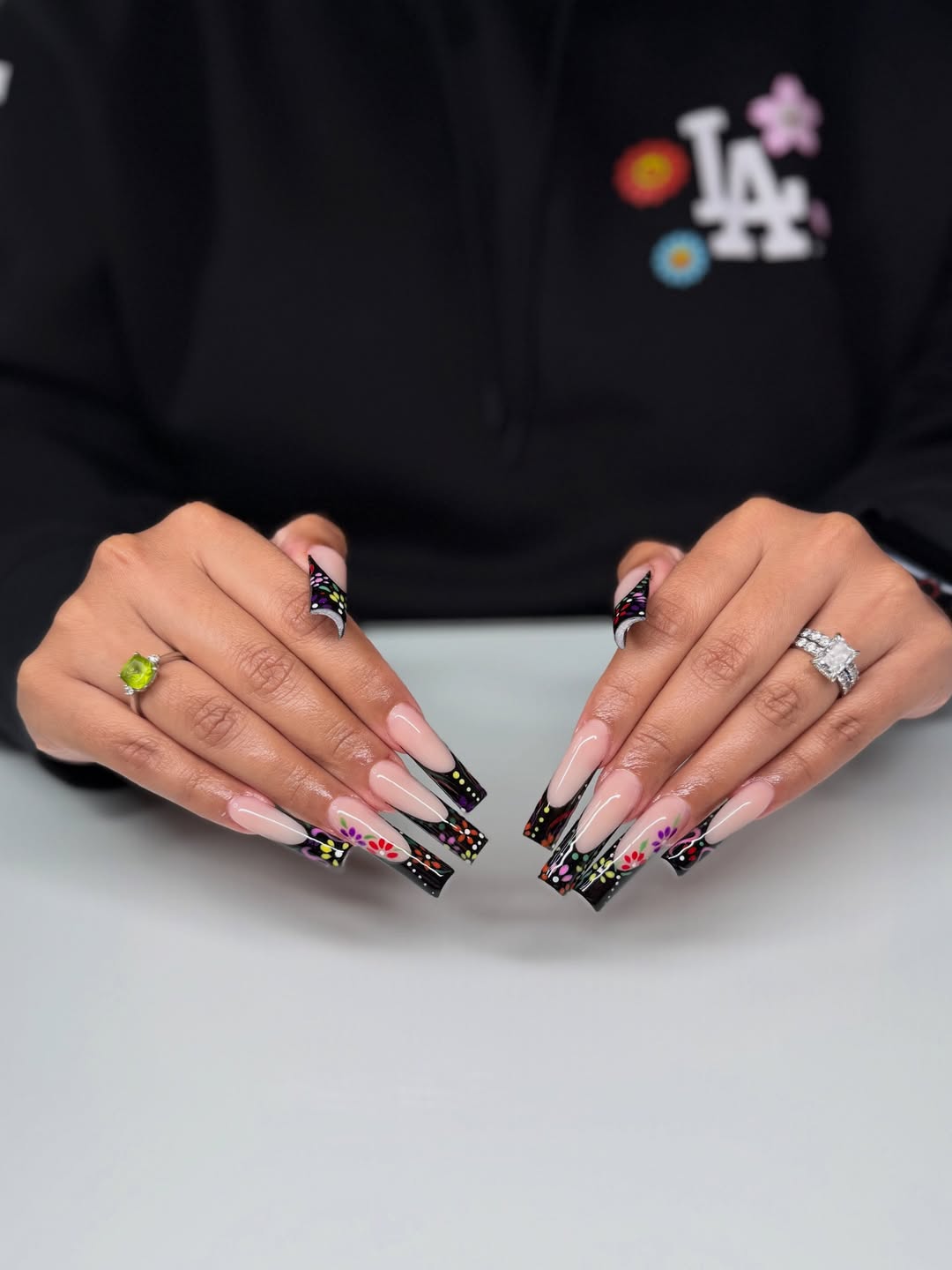 27 Stunning Mexican Nail Designs for 2026 25 Vibrant Floral Painted Black French Tip Coffin Nails
