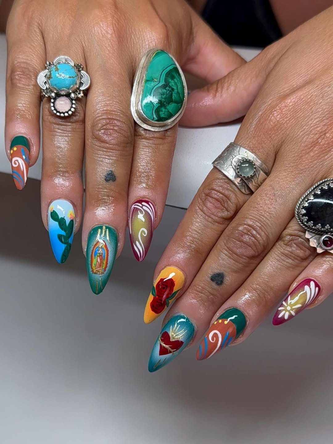 27 Stunning Mexican Nail Designs for 2026 6 Vibrant Mexican Folk Art Stiletto Nails