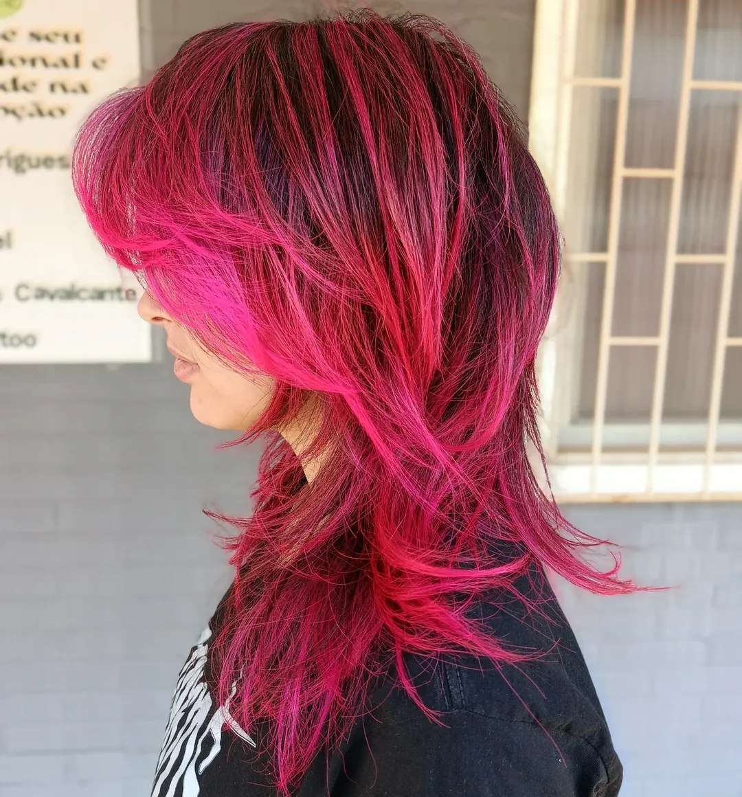 Vibrant Neon Pink Wolf Cut With Face Framing Layers