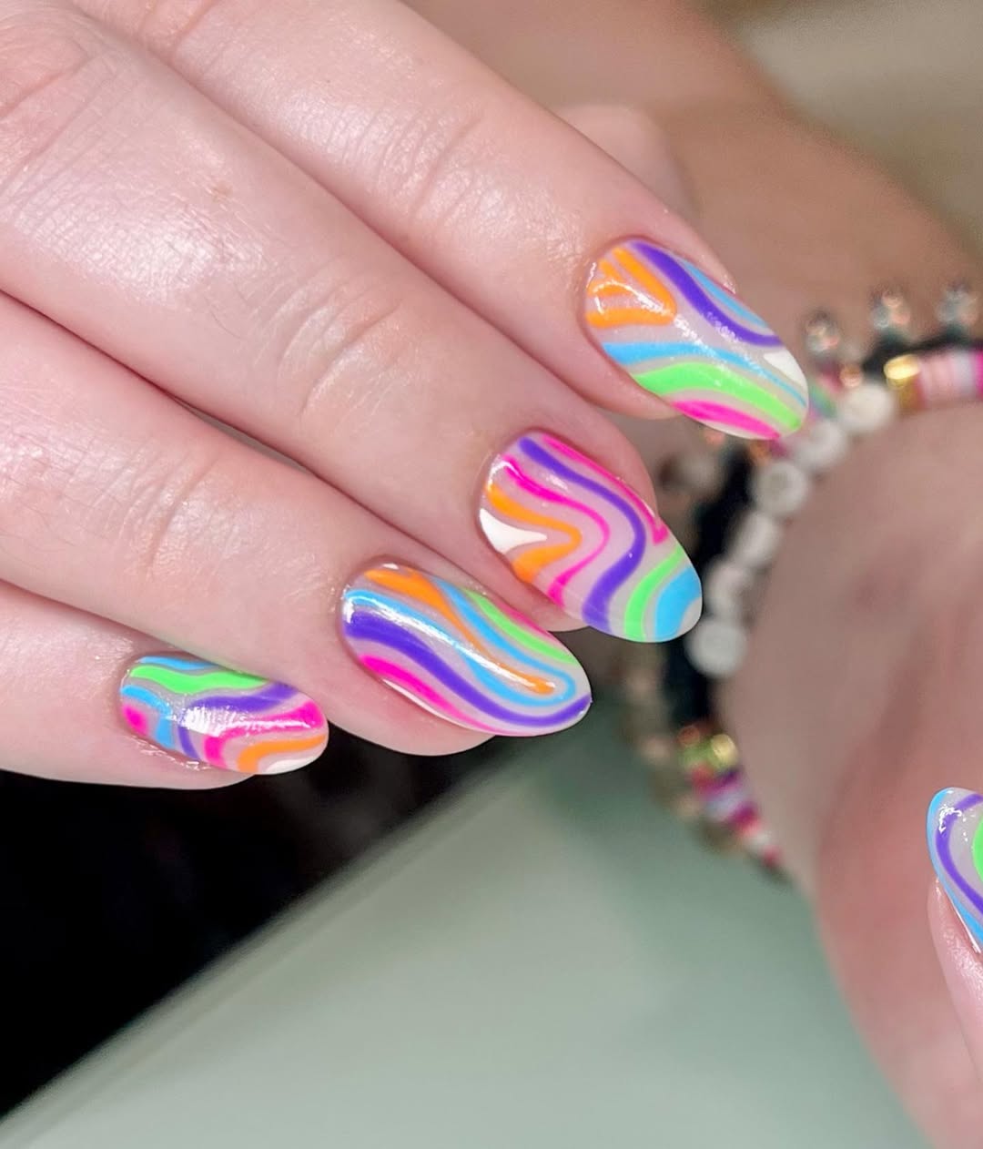 Vibrant Neon Swirl Glossy Oval Nails