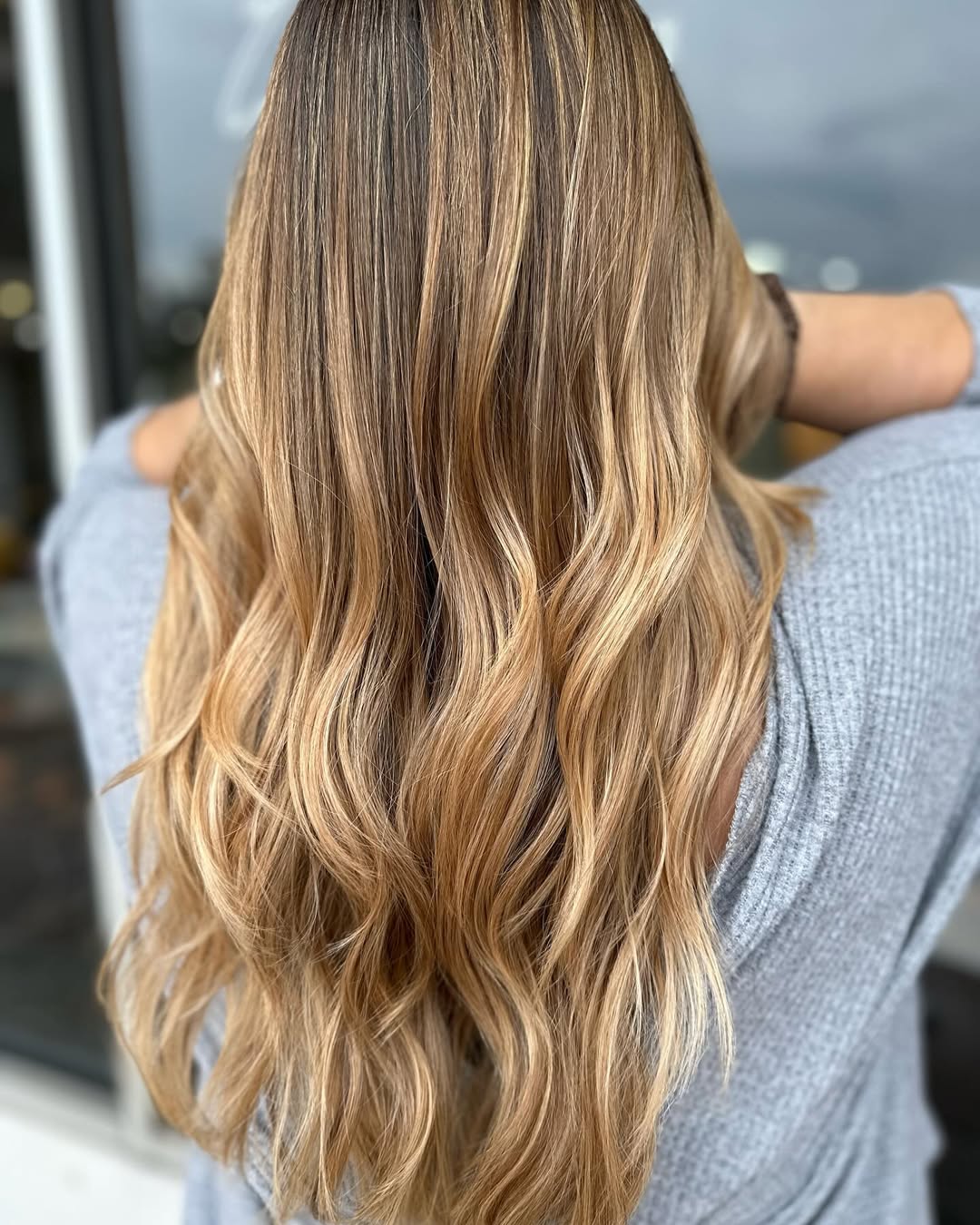 Warm Blonde And Caramel Waves With Shadow Root