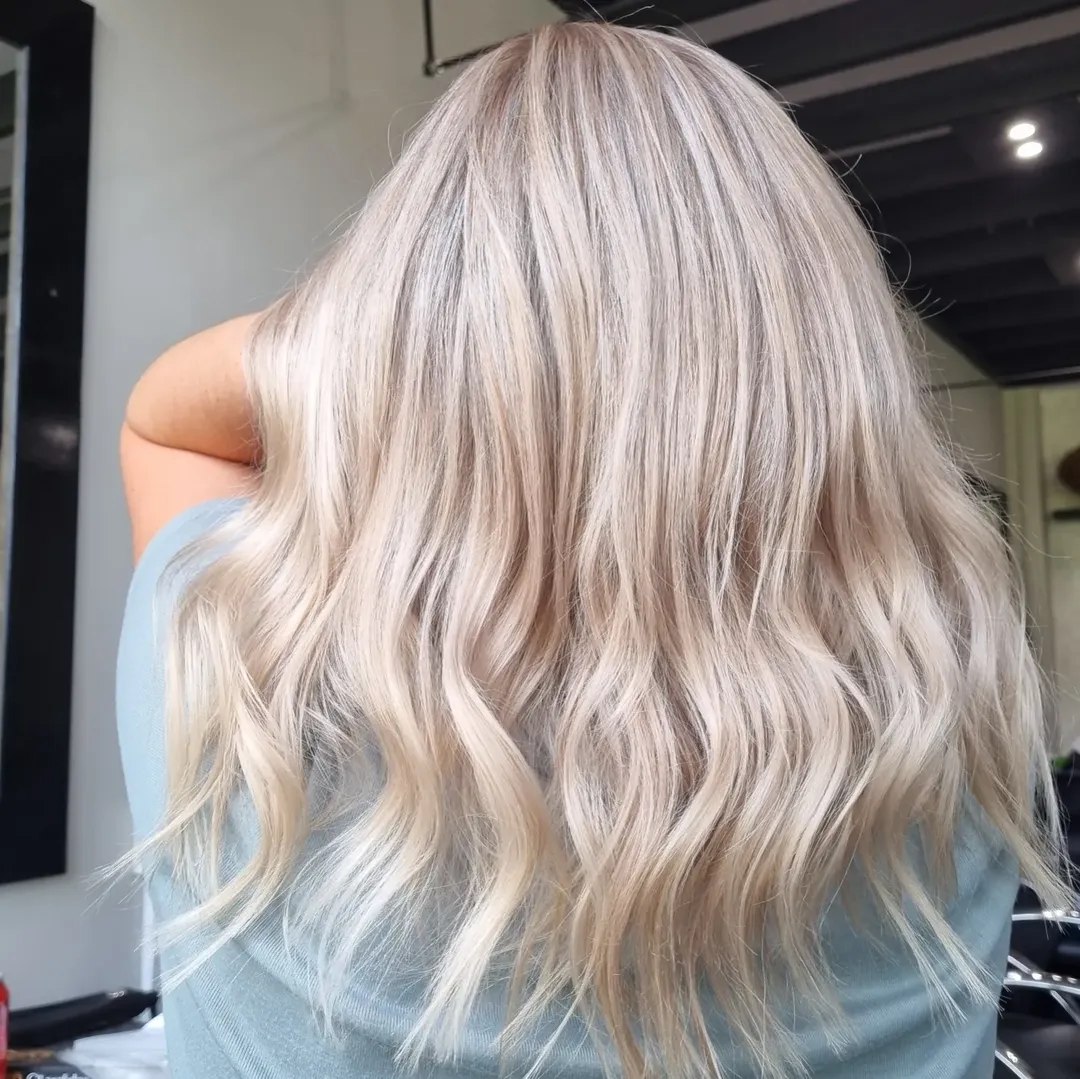 Wavy Platinum Blonde Shoulder Length Layers