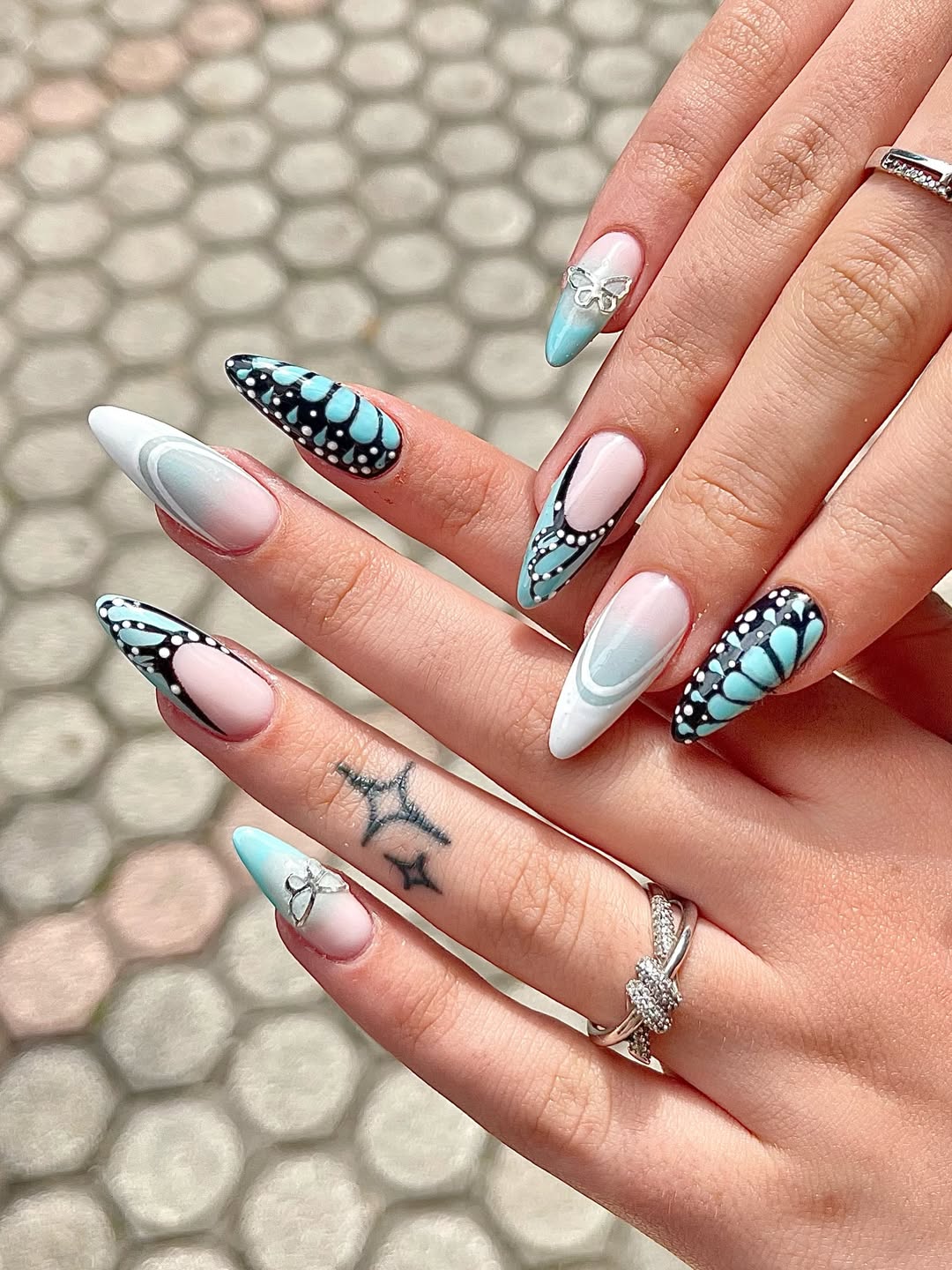 Whimsical Blue Butterfly Wing Stiletto Nails