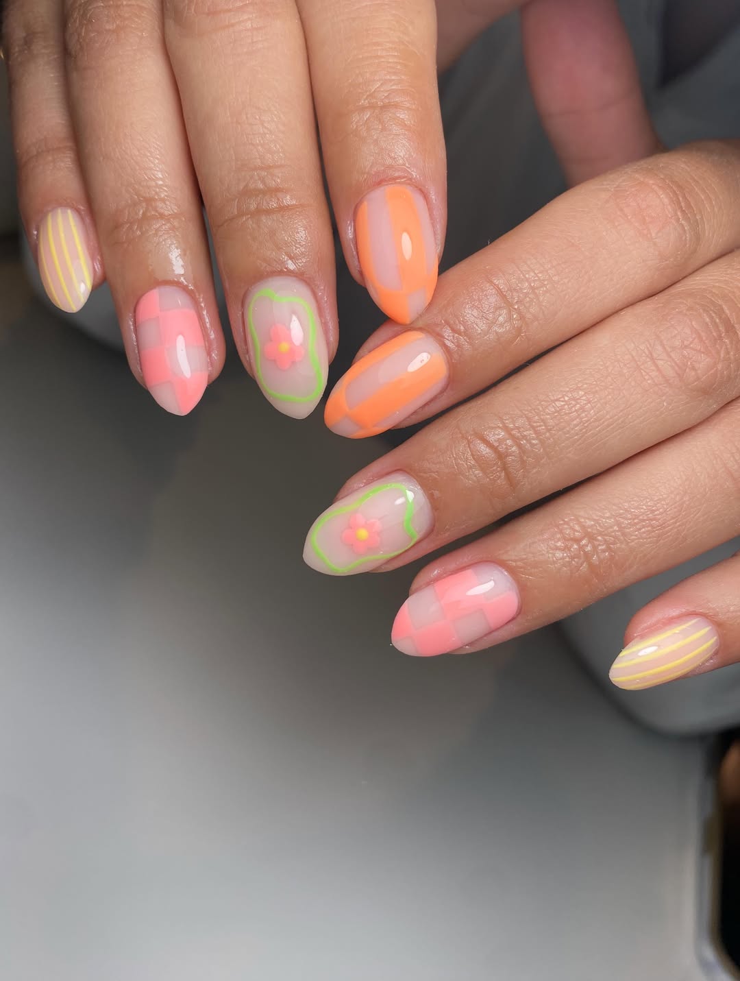 Whimsical Pastel Checkered and Striped Oval Nails