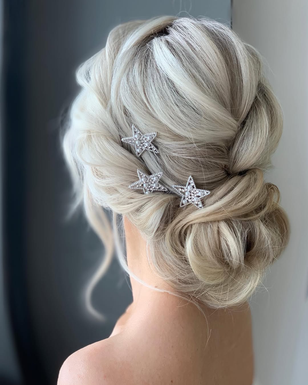 Whimsical Star Bridal Updo With Soft Waves