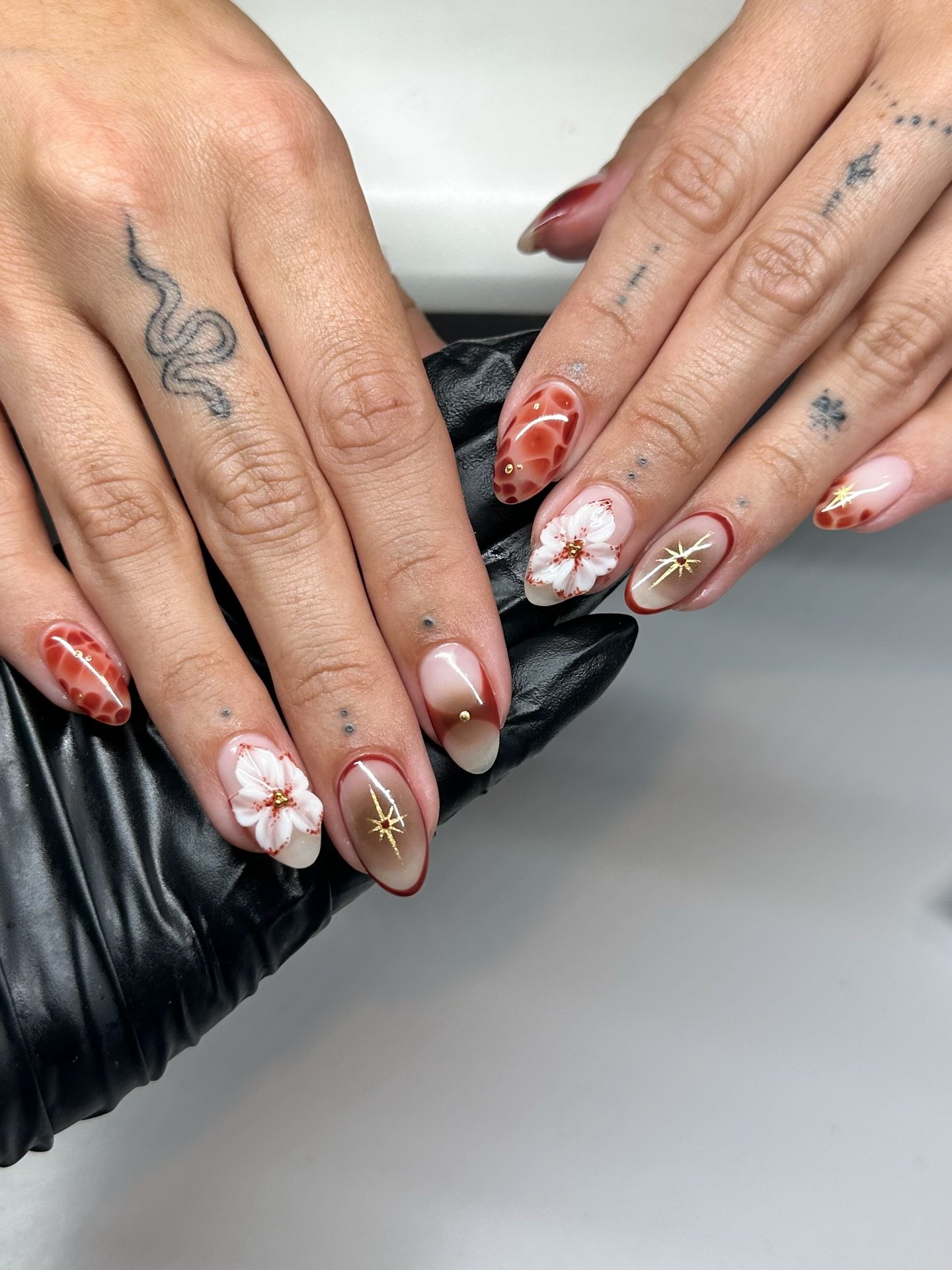 27 September Nails 2026 Trends You Must See 29 3D Floral Ombre Almond Nails with Gold Accents