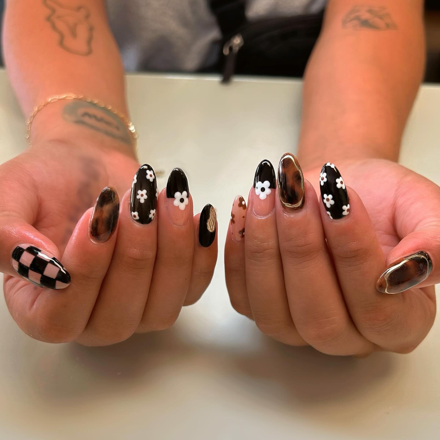 Abstract Tortoiseshell Flower Almond Nails