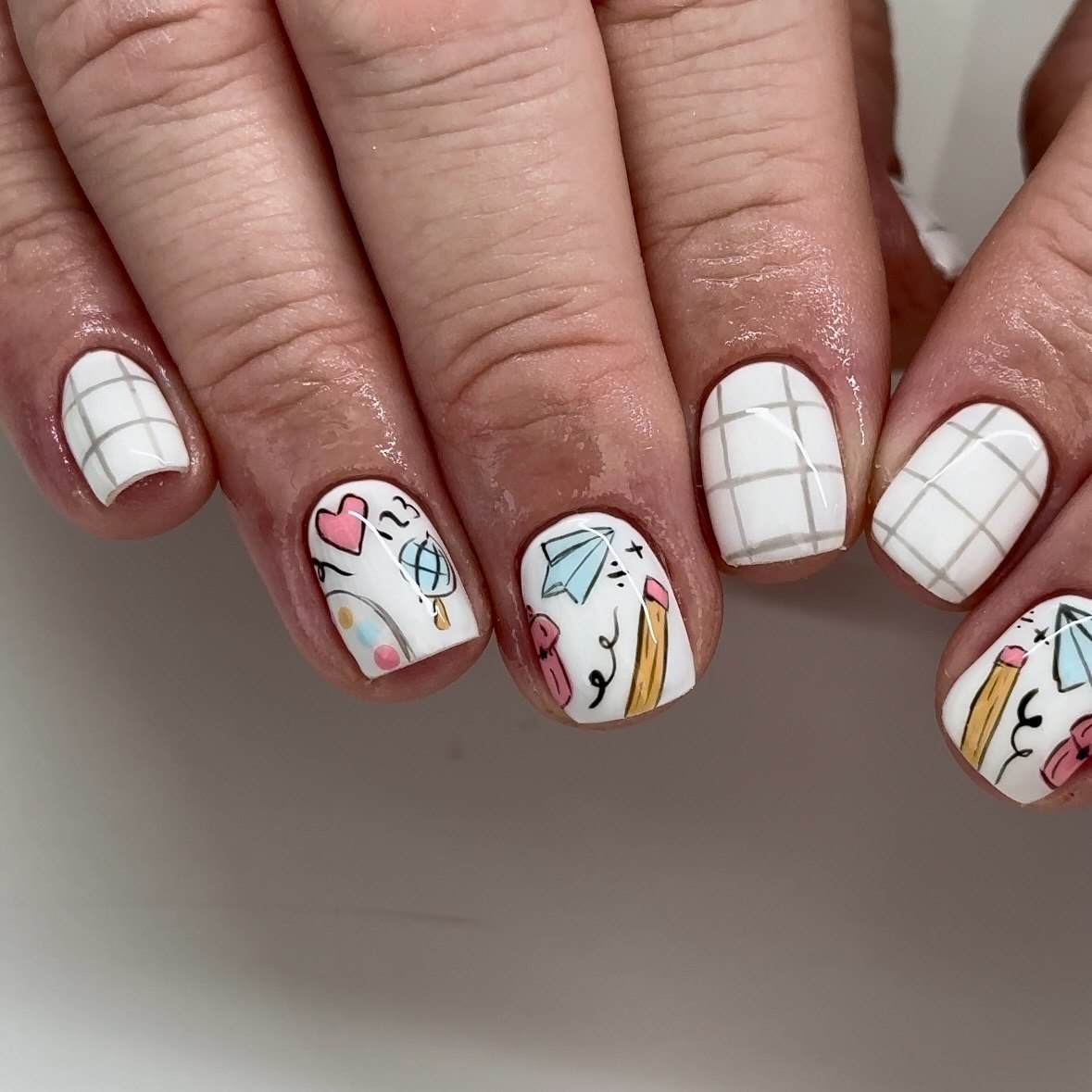 27 Back to School Nail Ideas for Teens 2026 10 Back To School Grid and Doodle Nails