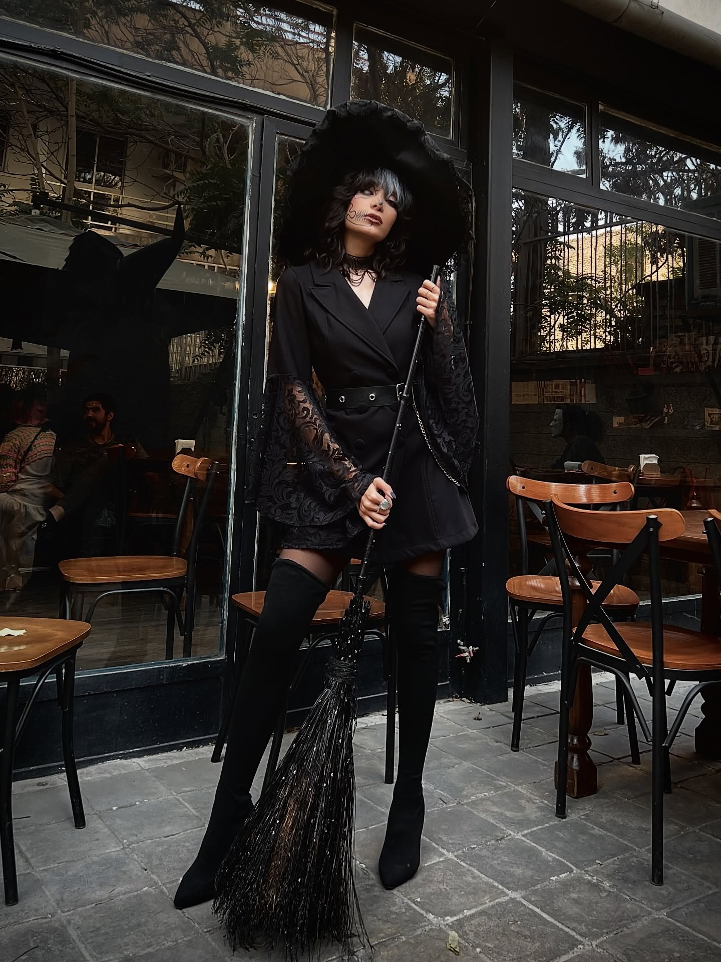25 Witchy Outfit Ideas for 2026 10 Black Lace Sleeve Blazer Dress Witchy Ensemble