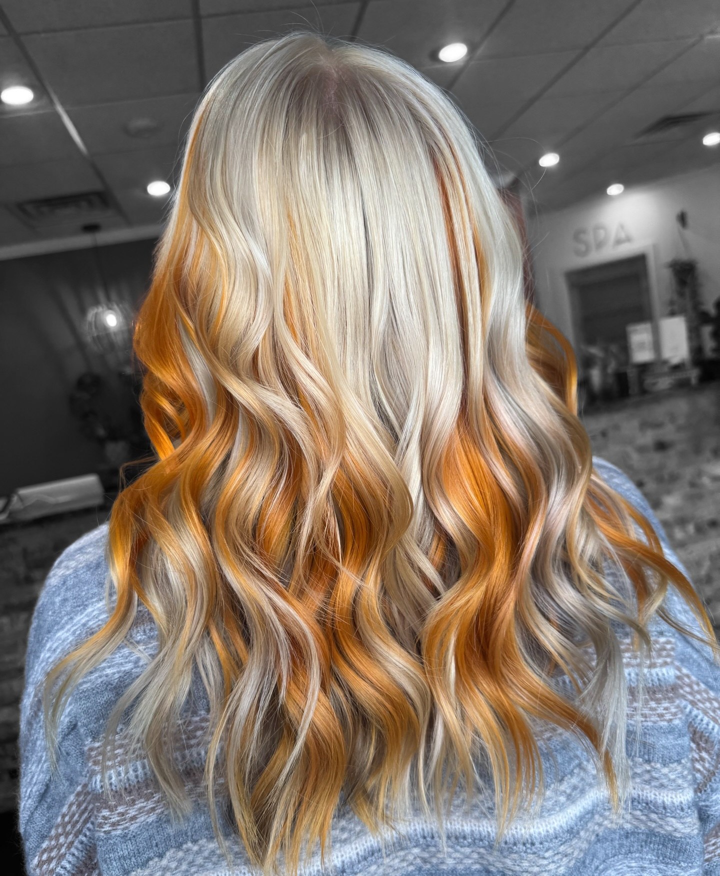 29 Calico Hair Color Styles You Need to See for 2026 4 Blonde With Fiery Orange Peekaboo Highlights