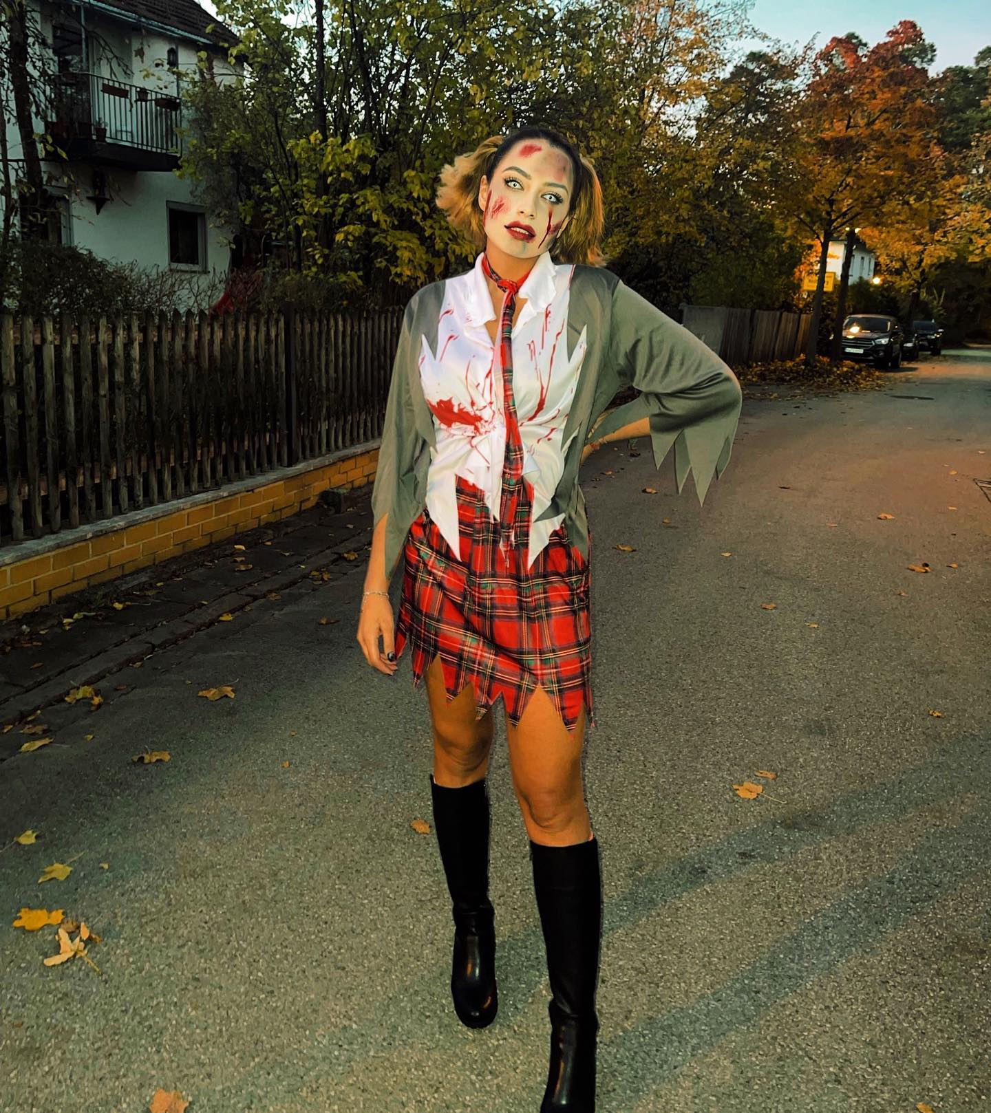 27 Spooktacular Halloween Outfits You Need for 2026 26 Bloody Zombie Cheerleader Halloween Costume